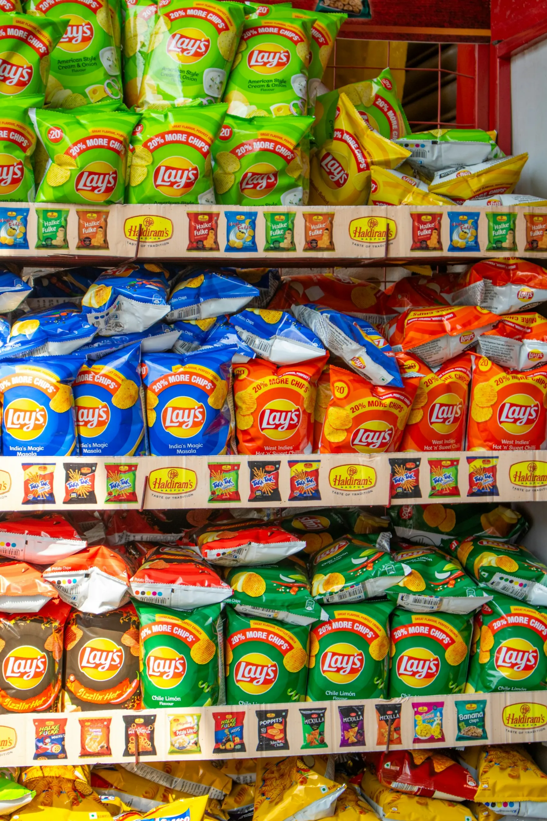 Indian snacks and grocery products on store shelves