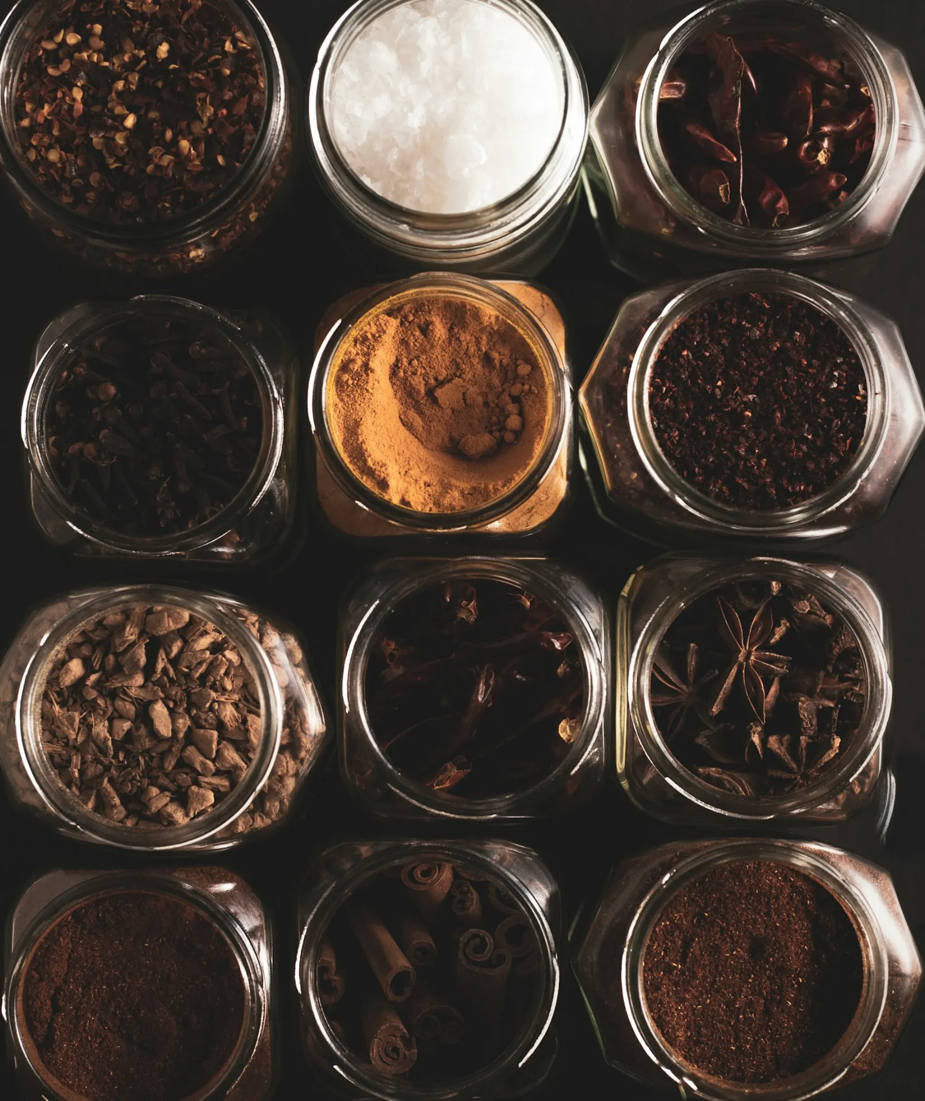 Spices in jars viewed from above