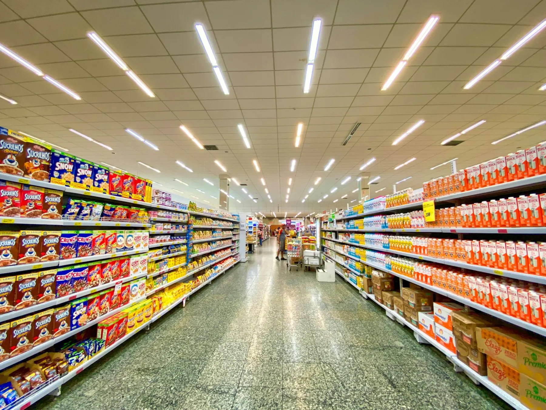 Supermarket aisle stocked with packaged food